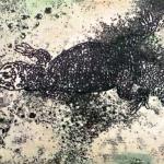 UN RETTILE  cera molle   corrosioni lasta di alluminio 
